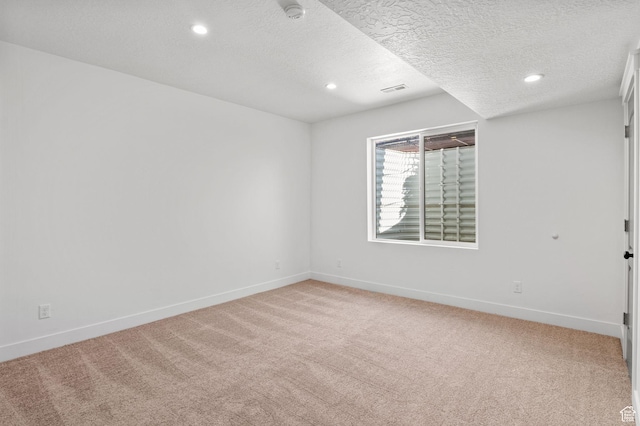 12612 S Starlite Hill Ln W, Herriman, UT 84096 - unfurnished room with light carpet, recessed lighting, baseboards, a textured ceiling, and a smoke detector