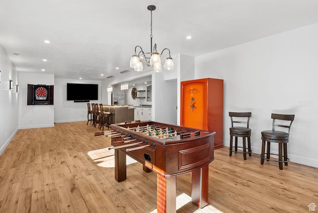 12612 S Starlite Hill Ln W, Herriman, UT 84096 - rec room featuring light wood finished floors, recessed lighting, a chandelier, and baseboards