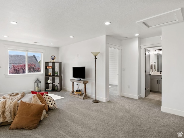 12612 S Starlite Hill Ln W, Herriman, UT 84096 - carpeted living room featuring recessed lighting, a textured ceiling, baseboards, and attic access
