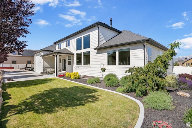 12612 S Starlite Hill Ln W, Herriman, UT 84096 - back of property featuring a patio and a shingled roof
