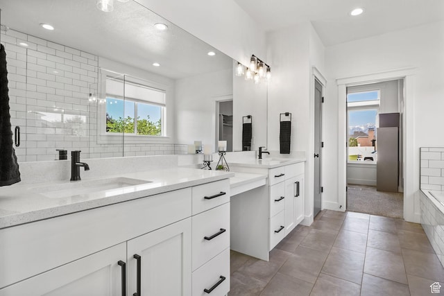 12612 S Starlite Hill Ln W, Herriman, UT 84096 - full bathroom featuring double vanity, plenty of natural light, recessed lighting, tile patterned floors, and tiled shower