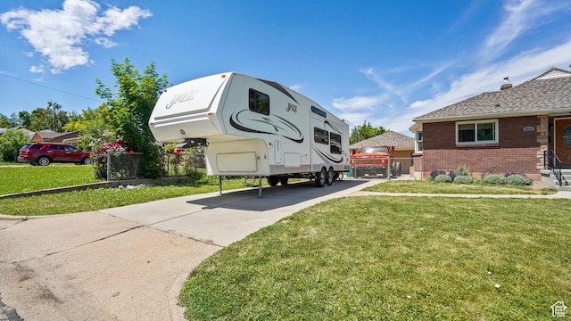 3711 Eccles E, Ogden, UT 84403 - view of parking featuring driveway