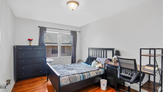 3711 Eccles E, Ogden, UT 84403 - bedroom featuring wood finished floors and baseboards