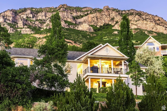 1559 E Oak Cliff Dr N, Provo, UT 84604 - back of house with a mountain view, stucco siding, and a balcony