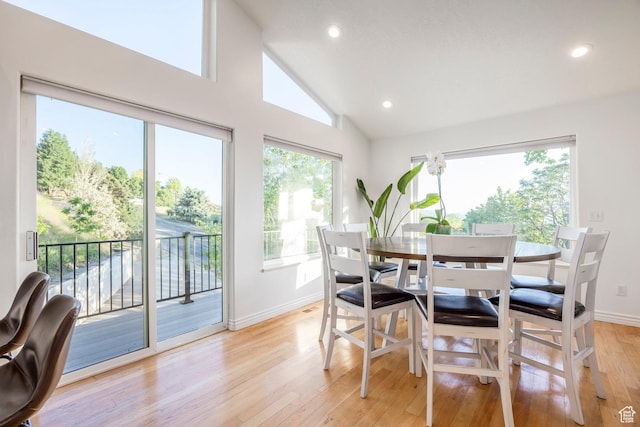 1559 E Oak Cliff Dr N, Provo, UT 84604 - dining area with baseboards, light wood-style flooring, recessed lighting, and high vaulted ceiling