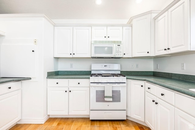 1559 E Oak Cliff Dr N, Provo, UT 84604 - kitchen featuring white appliances, dark countertops, white cabinets, recessed lighting, and light wood finished floors