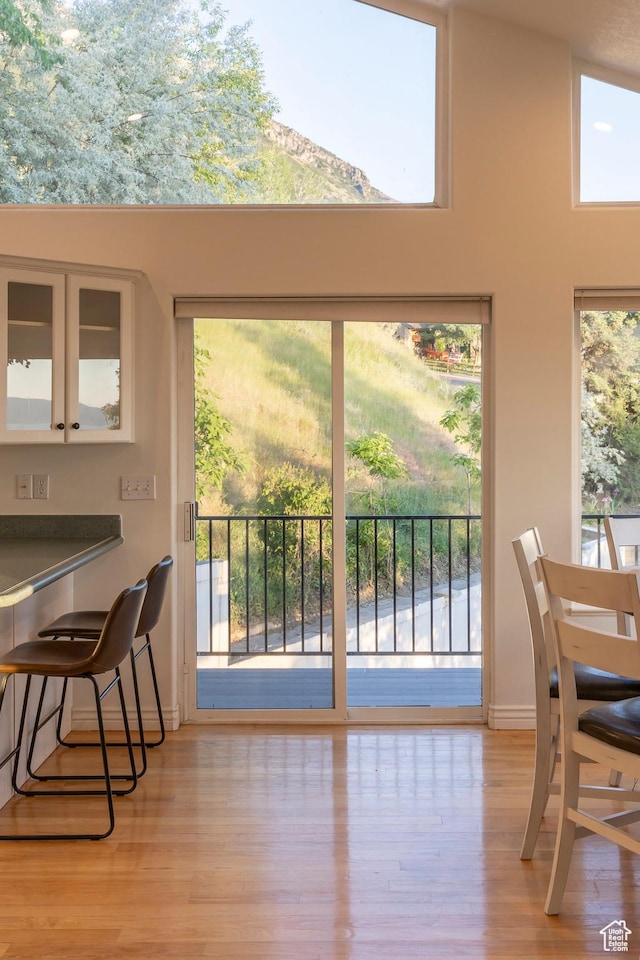1559 E Oak Cliff Dr N, Provo, UT 84604 - dining room featuring wood finished floors, baseboards, and a high ceiling