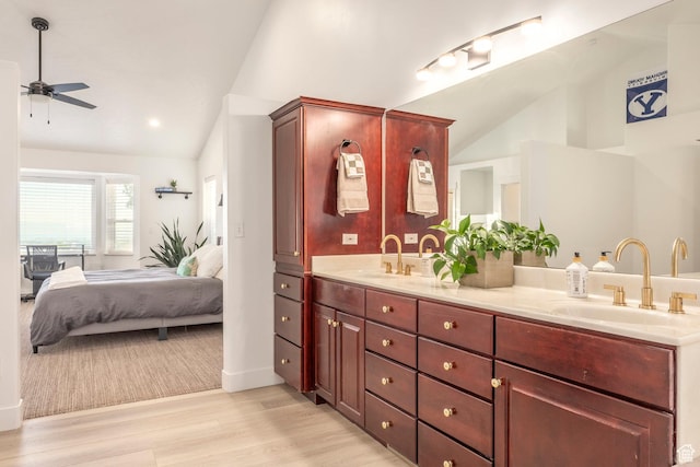 1559 E Oak Cliff Dr N, Provo, UT 84604 - ensuite bathroom featuring vaulted ceiling, double vanity, a ceiling fan, and wood finished floors