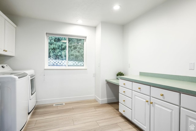 1559 E Oak Cliff Dr N, Provo, UT 84604 - washroom with separate washer and dryer, cabinet space, recessed lighting, light wood-style floors, and baseboards