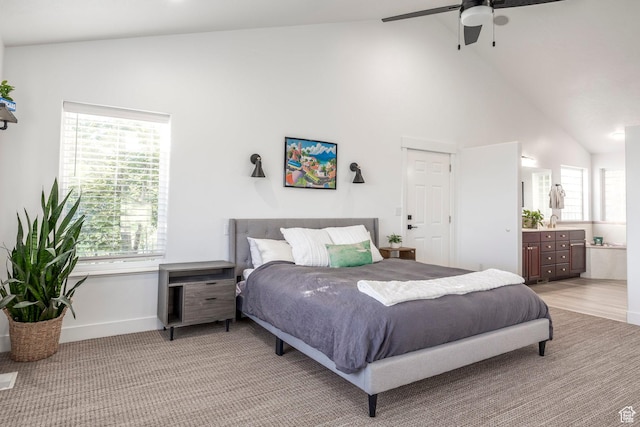 1559 E Oak Cliff Dr N, Provo, UT 84604 - bedroom with high vaulted ceiling, connected bathroom, baseboards, light colored carpet, and a ceiling fan
