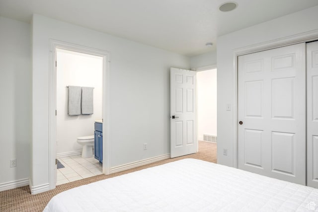 1559 E Oak Cliff Dr N, Provo, UT 84604 - bedroom with a closet, baseboards, and connected bathroom