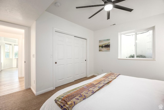 1559 E Oak Cliff Dr N, Provo, UT 84604 - carpeted bedroom with baseboards, a closet, and ceiling fan