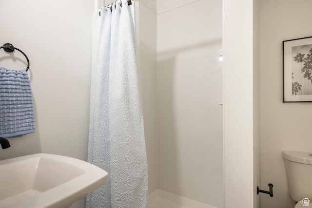 1559 E Oak Cliff Dr N, Provo, UT 84604 - full bathroom featuring a sink, a stall shower, and toilet