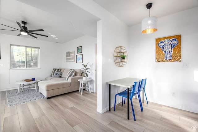 1559 E Oak Cliff Dr N, Provo, UT 84604 - living area featuring light wood-style floors, a ceiling fan, and baseboards