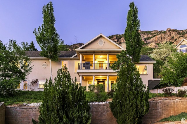 1559 E Oak Cliff Dr N, Provo, UT 84604 - view of front of property featuring a balcony and stucco siding