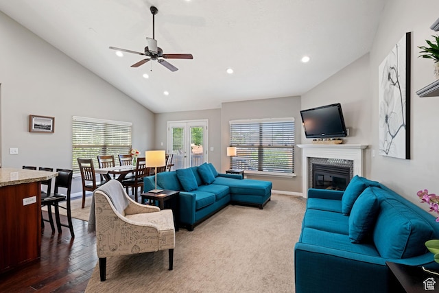 128 W 8600 S, Midvale, UT 84047 - living room with a glass covered fireplace, a ceiling fan, recessed lighting, baseboards, and high vaulted ceiling