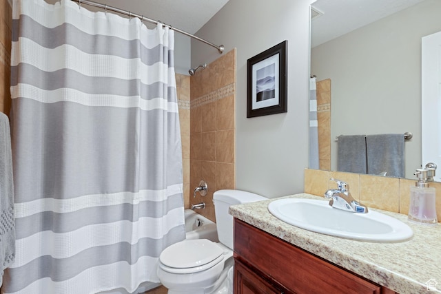 128 W 8600 S, Midvale, UT 84047 - bathroom featuring vanity, toilet, and shower / tub combo with curtain