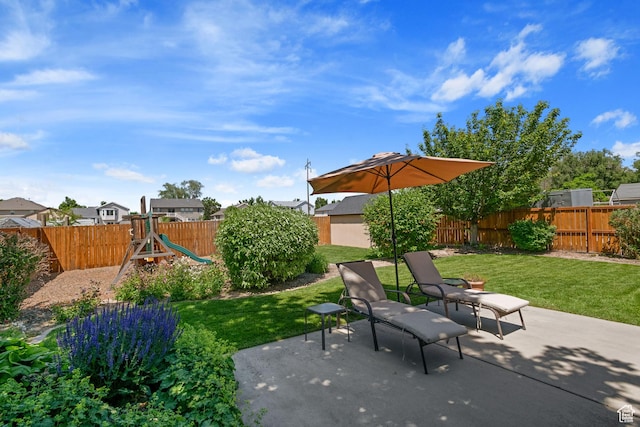 128 W 8600 S, Midvale, UT 84047 - view of patio featuring a playground