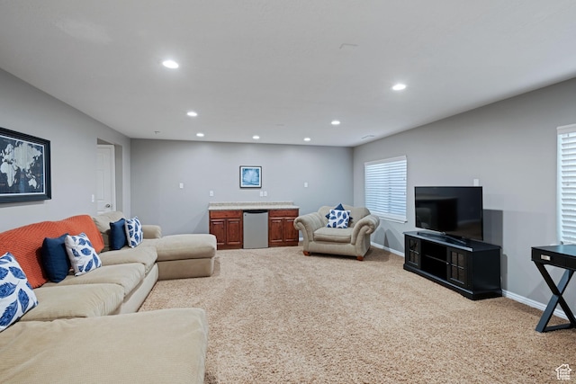 128 W 8600 S, Midvale, UT 84047 - carpeted living area featuring recessed lighting, baseboards, and bar area