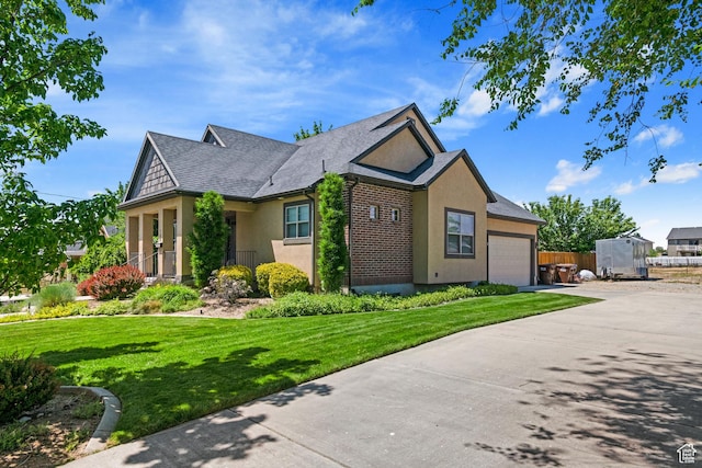 128 W 8600 S, Midvale, UT 84047 - view of front facade featuring an attached garage, stucco siding, concrete driveway, and roof with shingles