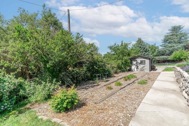 983 Westwood Dr, Pleasant View, UT 84414 - view of yard featuring a garden