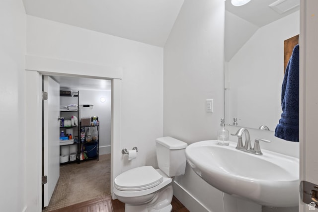 760 W Holliday Dr, Kamas, UT 84036 - half bath featuring toilet, a sink, lofted ceiling, and wood finished floors