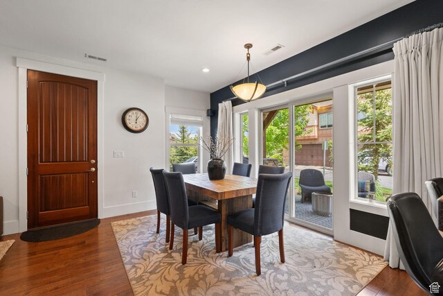 760 W Holliday Dr, Kamas, UT 84036 - dining area featuring baseboards, wood finished floors, and recessed lighting