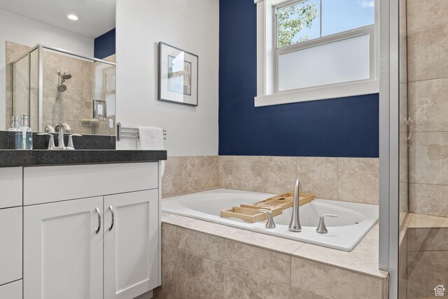 760 W Holliday Dr, Kamas, UT 84036 - full bathroom featuring vanity, a shower stall, and a garden tub
