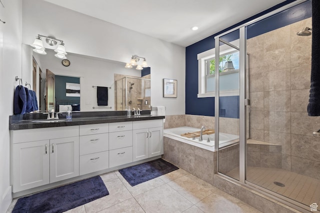 760 W Holliday Dr, Kamas, UT 84036 - full bathroom with a stall shower, double vanity, tile patterned flooring, and a garden tub