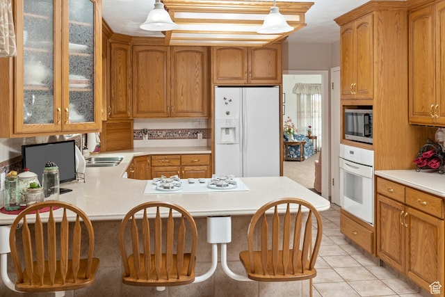 102 S 1000 W, Tremonton, UT 84337 - kitchen with white appliances, light countertops, glass insert cabinets, and light tile patterned floors