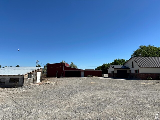102 S 1000 W, Tremonton, UT 84337 - view of side of home with an outbuilding