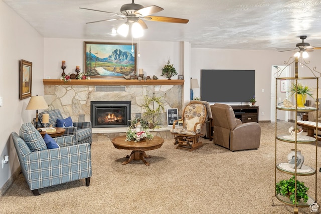 102 S 1000 W, Tremonton, UT 84337 - living area with a ceiling fan, carpet flooring, and a stone fireplace