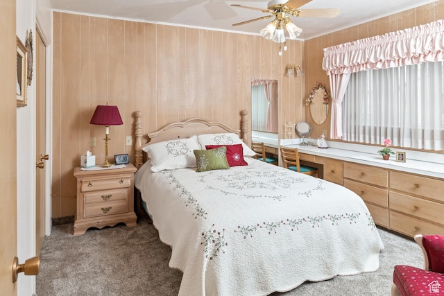 102 S 1000 W, Tremonton, UT 84337 - carpeted bedroom with crown molding, wood walls, and ceiling fan