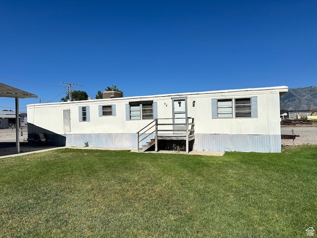 102 S 1000 W, Tremonton, UT 84337 - view of front of home featuring a front lawn