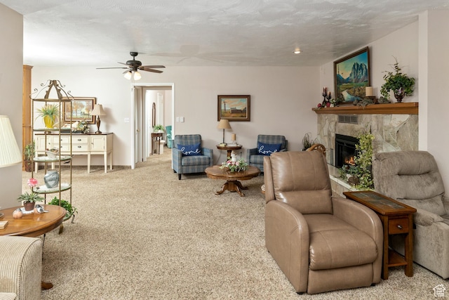 102 S 1000 W, Tremonton, UT 84337 - carpeted living room with ceiling fan and a glass covered fireplace