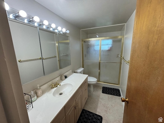 230 S 700 E, Orem, UT 84097 - bathroom with toilet, a shower stall, vanity, and tile patterned floors