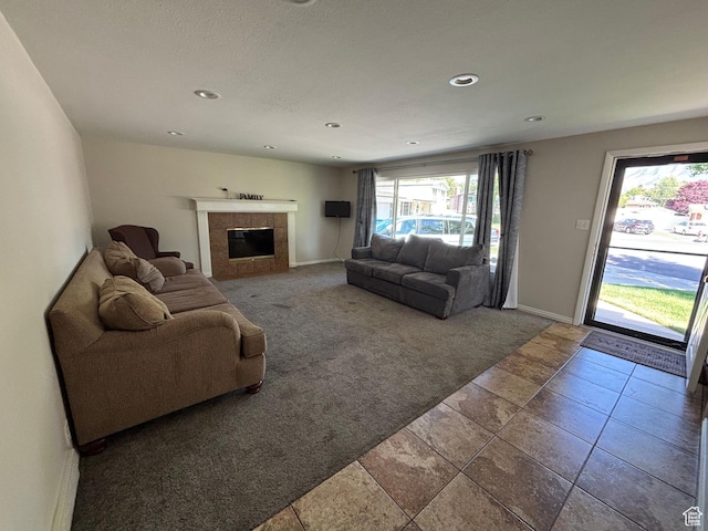 230 S 700 E, Orem, UT 84097 - carpeted living room with a tile fireplace, baseboards, and recessed lighting