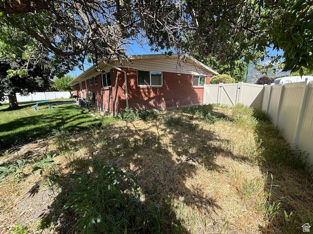 230 S 700 E, Orem, UT 84097 - back of property featuring brick siding and a gate