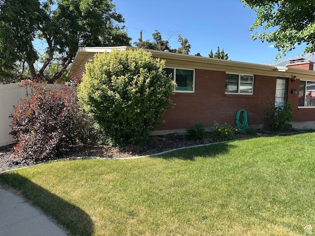 230 S 700 E, Orem, UT 84097 - view of side of home with a yard and brick siding