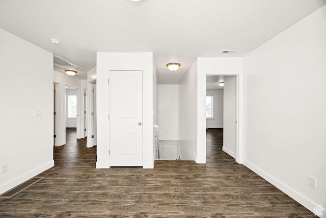 763 W 1060 S, Logan, UT 84321 - unfurnished room with dark wood-style flooring, baseboards, and a smoke detector
