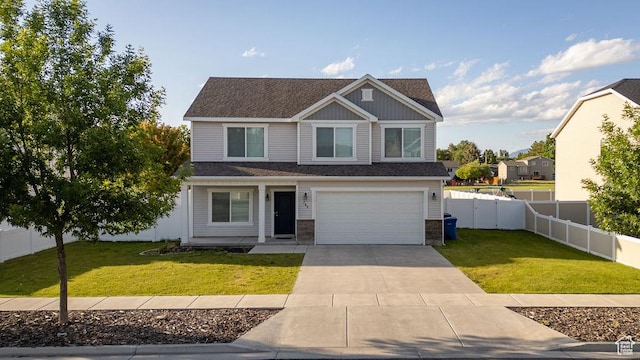 763 W 1060 S, Logan, UT 84321 - view of front of property with driveway, an attached garage, stone siding, and a shingled roof