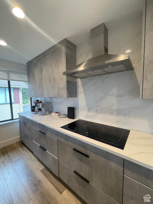 3599 E Oakview Dr, Millcreek, UT 84124 - kitchen featuring wall chimney range hood, black electric stovetop, and gray cabinetry