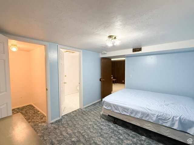1066 Beecher Ave, Brigham City, UT 84302 - bedroom with carpet flooring, a textured ceiling, and baseboards