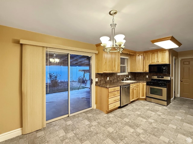 1066 Beecher Ave, Brigham City, UT 84302 - kitchen featuring stainless steel appliances, a chandelier, light brown cabinets, and decorative backsplash
