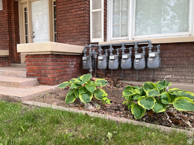 823 E 23rd St S, Ogden, UT 84401 - exterior view of brick siding and gas meter