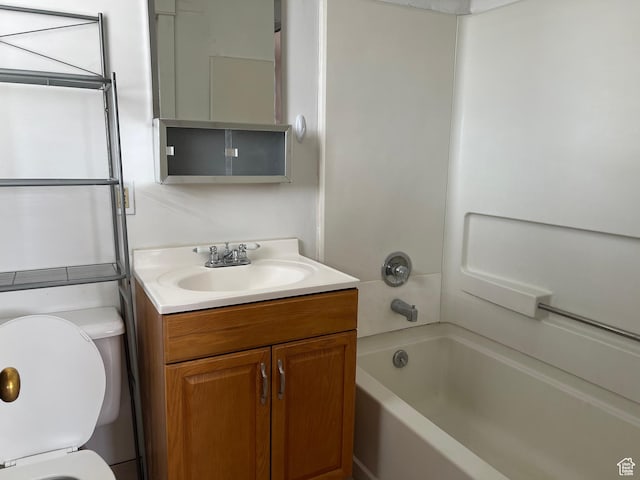 823 E 23rd St S, Ogden, UT 84401 - bathroom with toilet, vanity, and washtub / shower combination