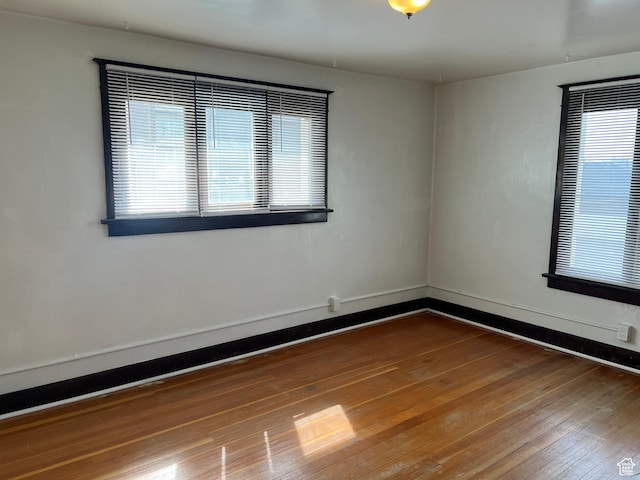 823 E 23rd St S, Ogden, UT 84401 - spare room featuring hardwood / wood-style floors and baseboards
