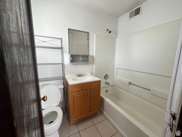 823 E 23rd St S, Ogden, UT 84401 - bathroom with toilet, tile patterned flooring, vanity, and  shower combination