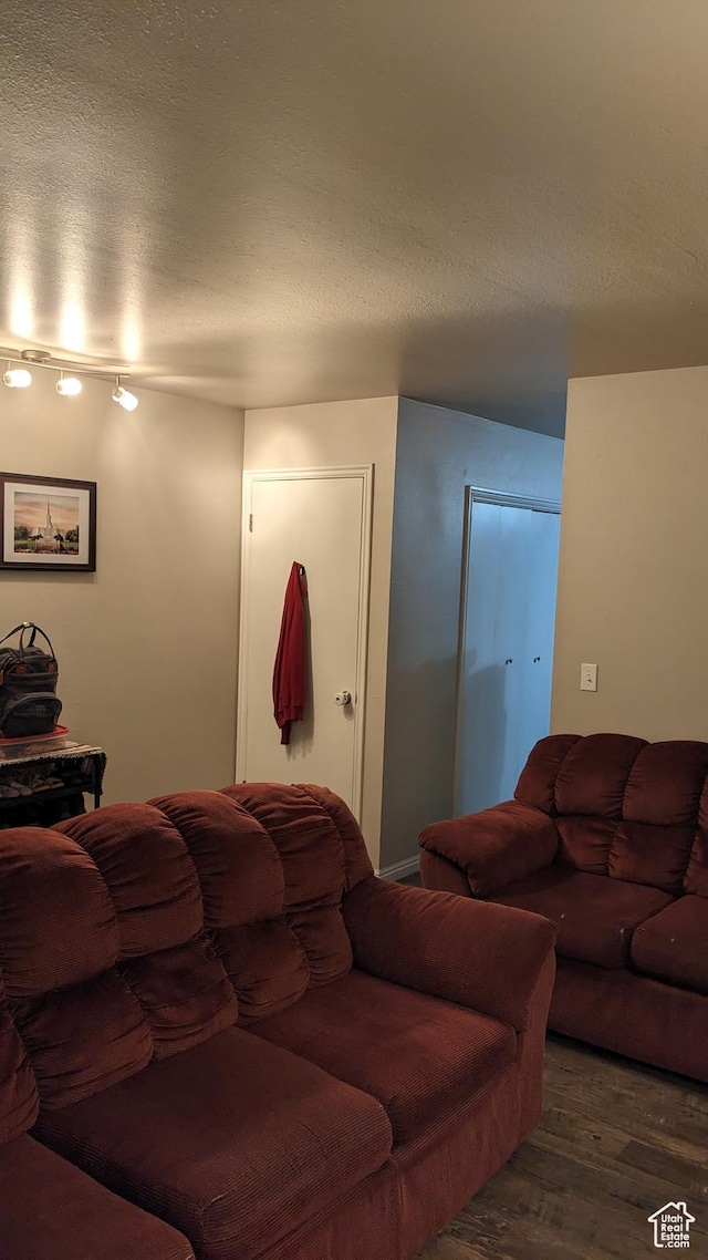 7923 S Main St W Unit 11, Midvale, UT 84047 - living room featuring wood finished floors and a textured ceiling