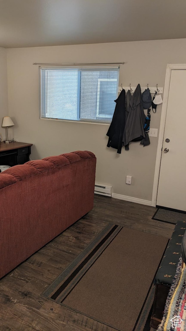 7923 S Main St W Unit 11, Midvale, UT 84047 - living area featuring a baseboard radiator, wood finished floors, and baseboards